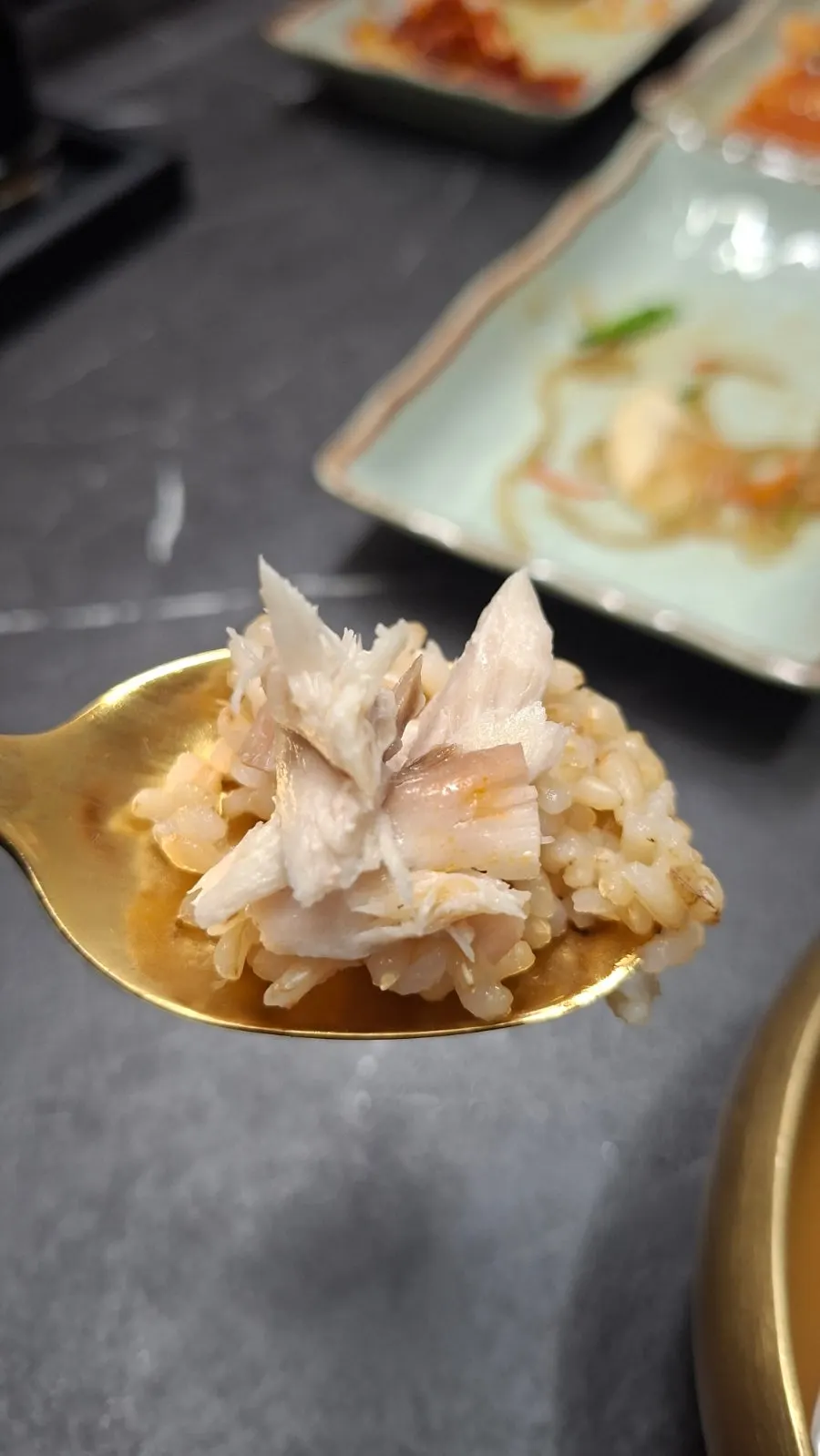 Dining table with the grilled fish meal