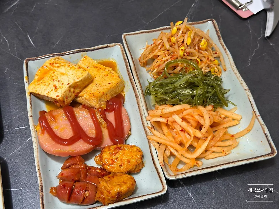 A plate of small portions of self-serve side dishes for two