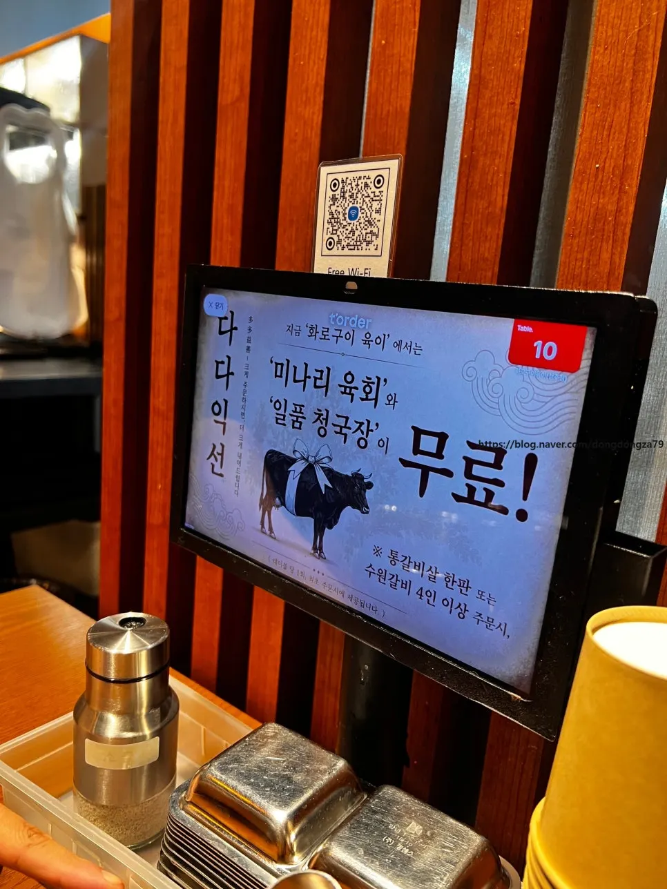 Cozy dining hall at Yugi Main Branch lit with warm yellow lighting