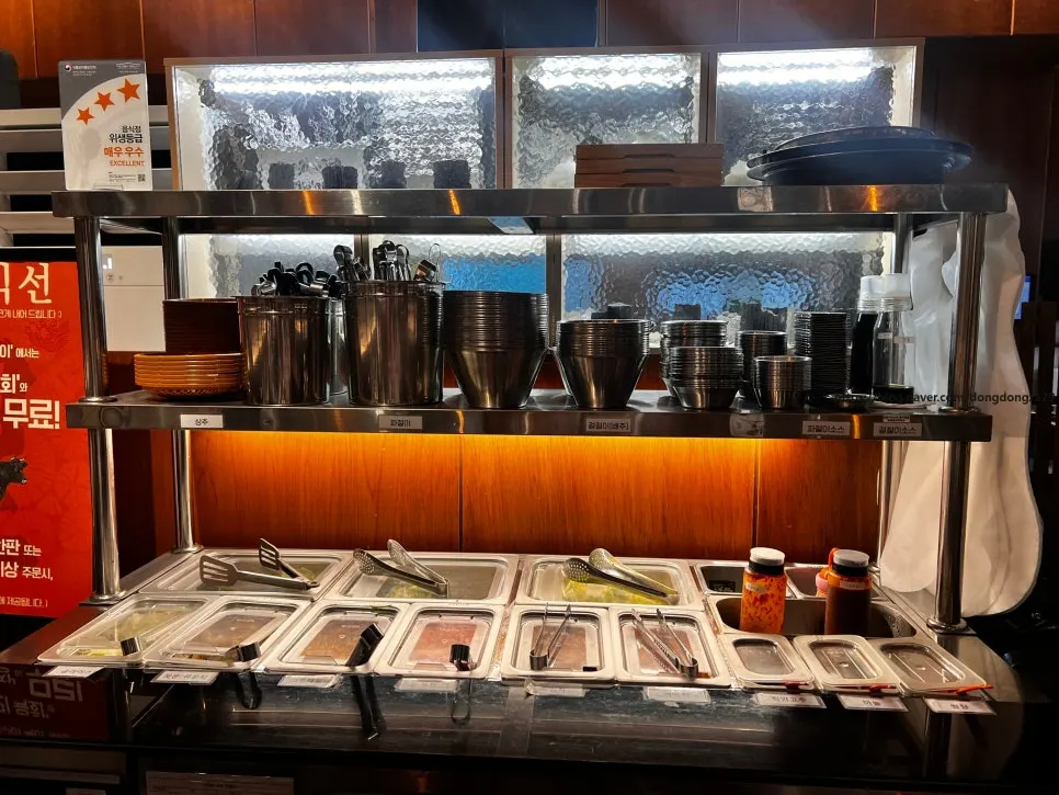 Spacious table with an individual charcoal grill and ventilation fan