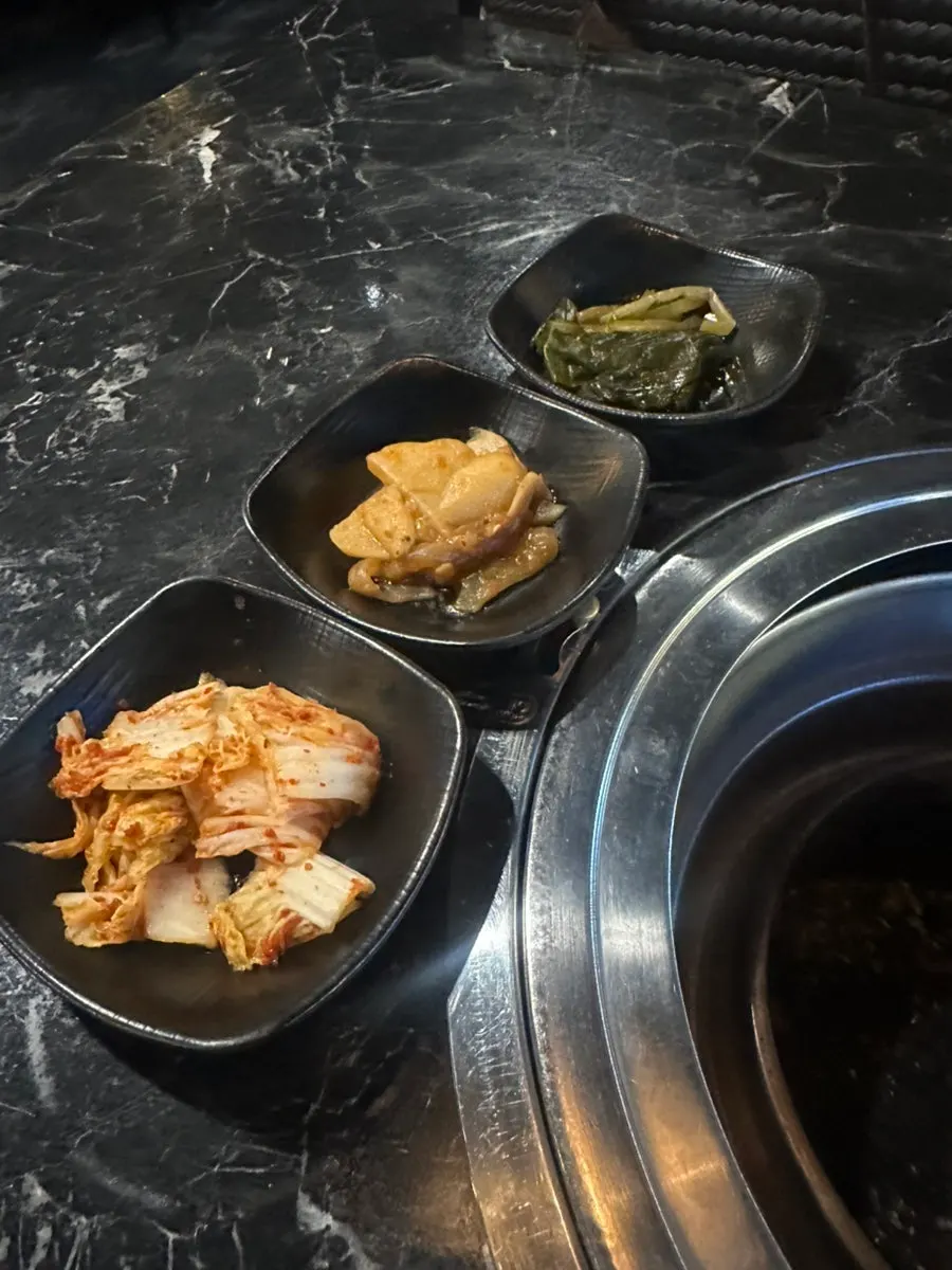 Kimchi, pickles, and salad banchan spread