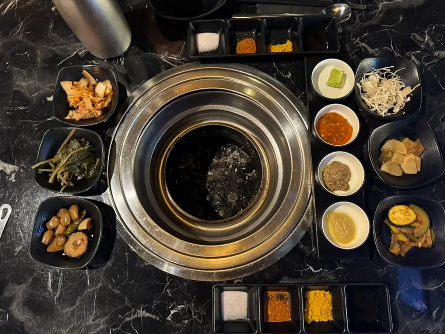 Neatly arranged side dishes and sauces