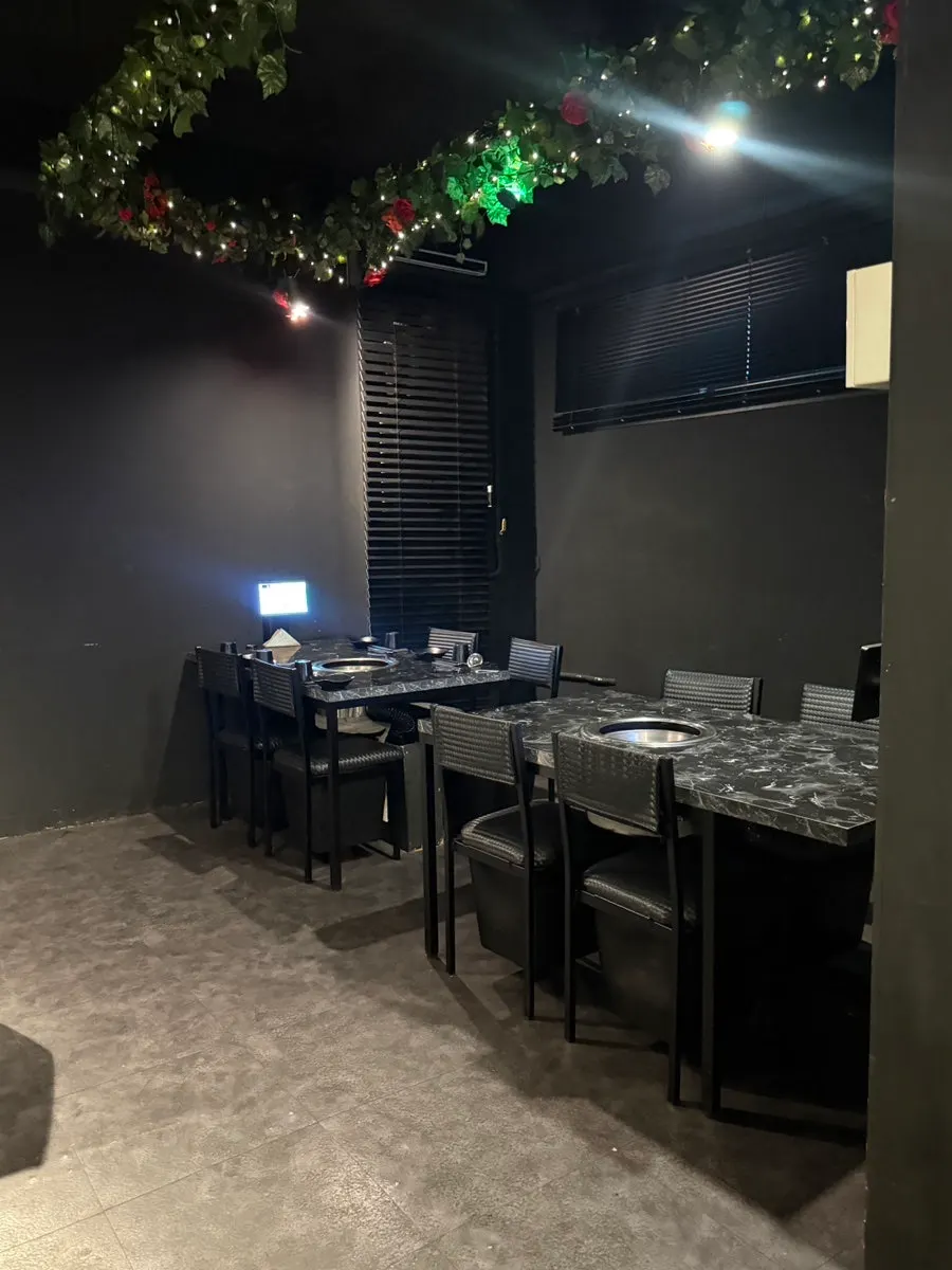 Seating with generous table spacing at Yuklab Gangnam