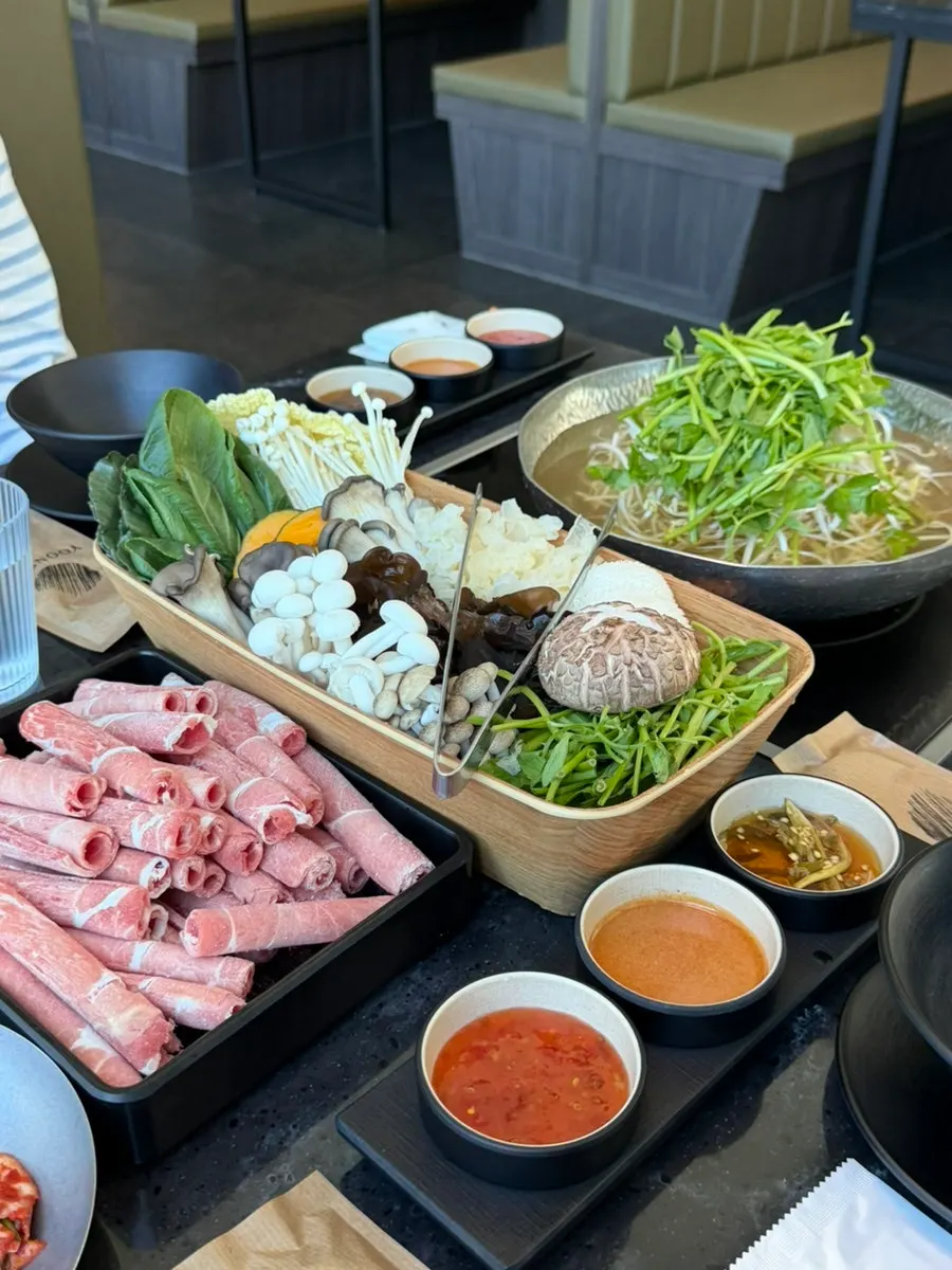 Table set with the full 4-person shabu-shabu spread