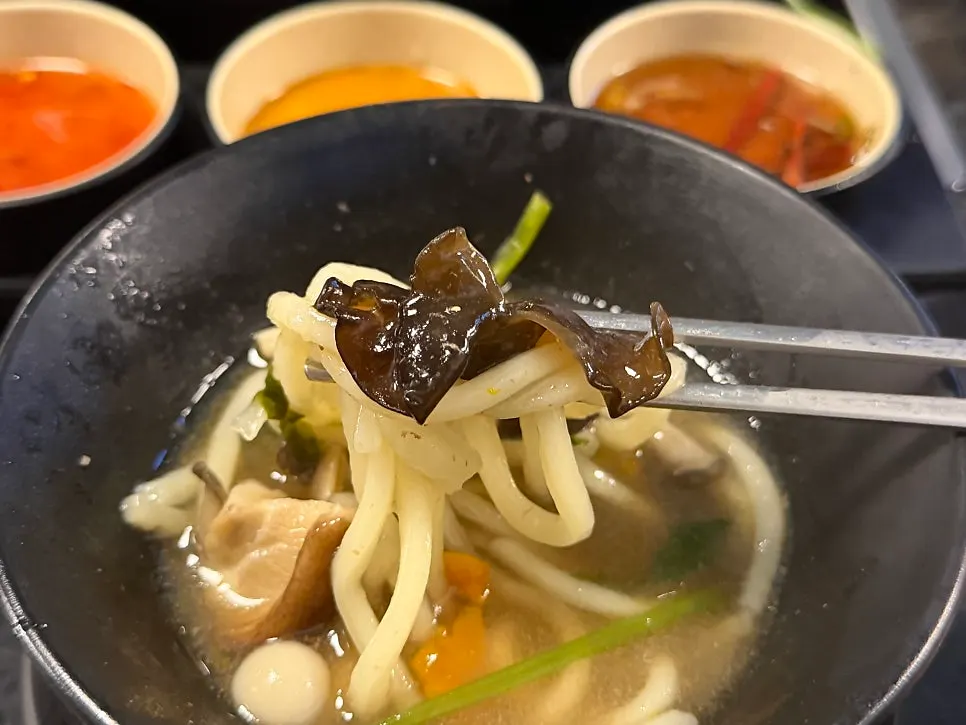 Noodles added to the richer anchovy broth
