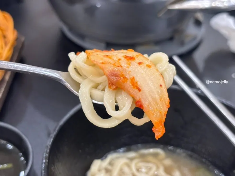 Kalguksu eaten with fresh kimchi