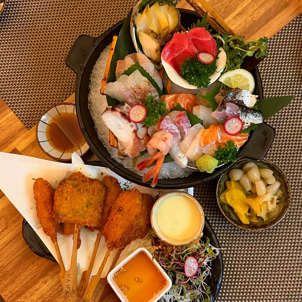Side dish plate with pickled shallots, ginger, and fresh wasabi