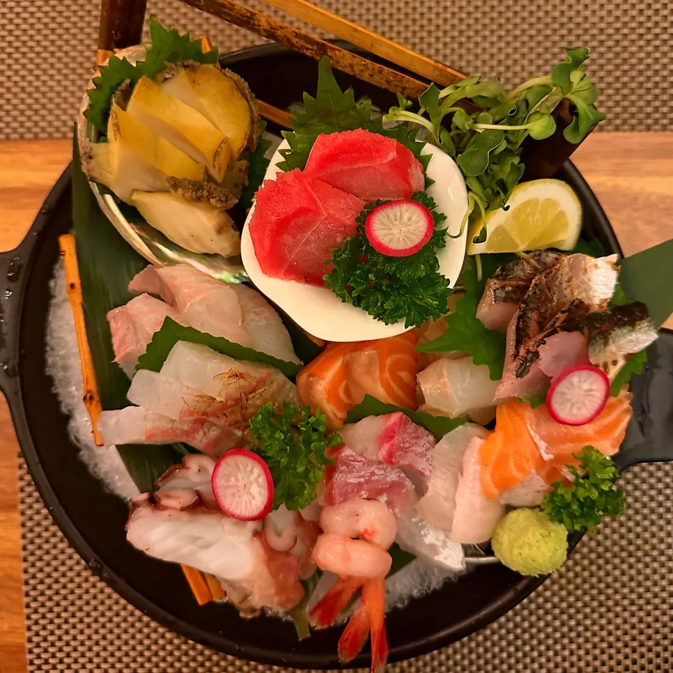 Table spread with assorted sashimi for two and half kushikatsu at Yoran