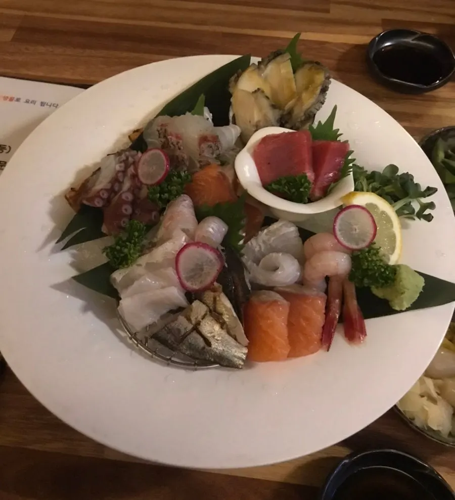 Thickly sliced sashimi platter for two on the table