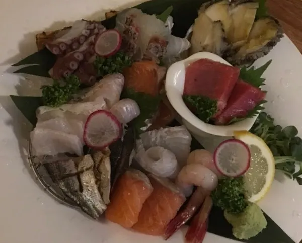 Sashimi plate with flounder, salmon, and abalone