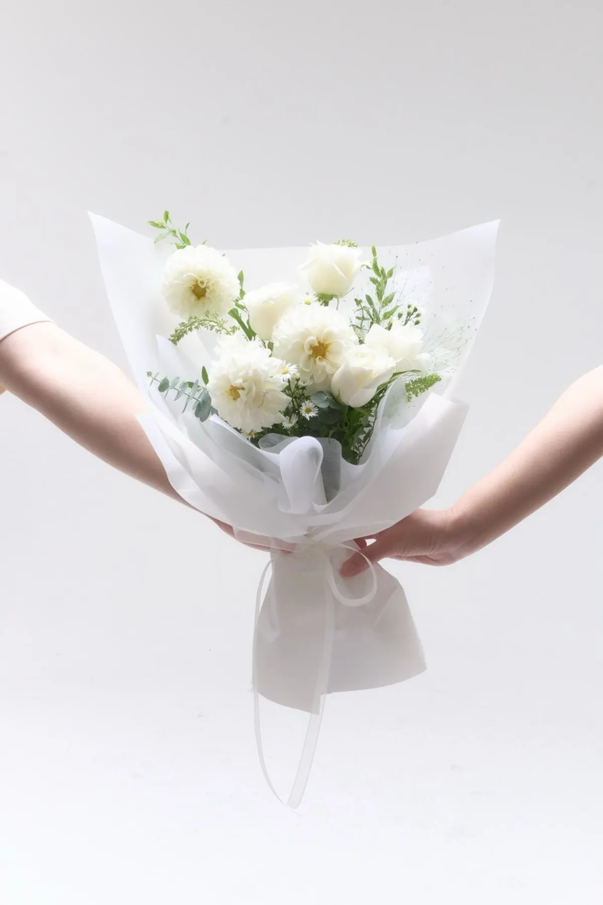 2nd anniversary couple photo in a white dress and black jacket