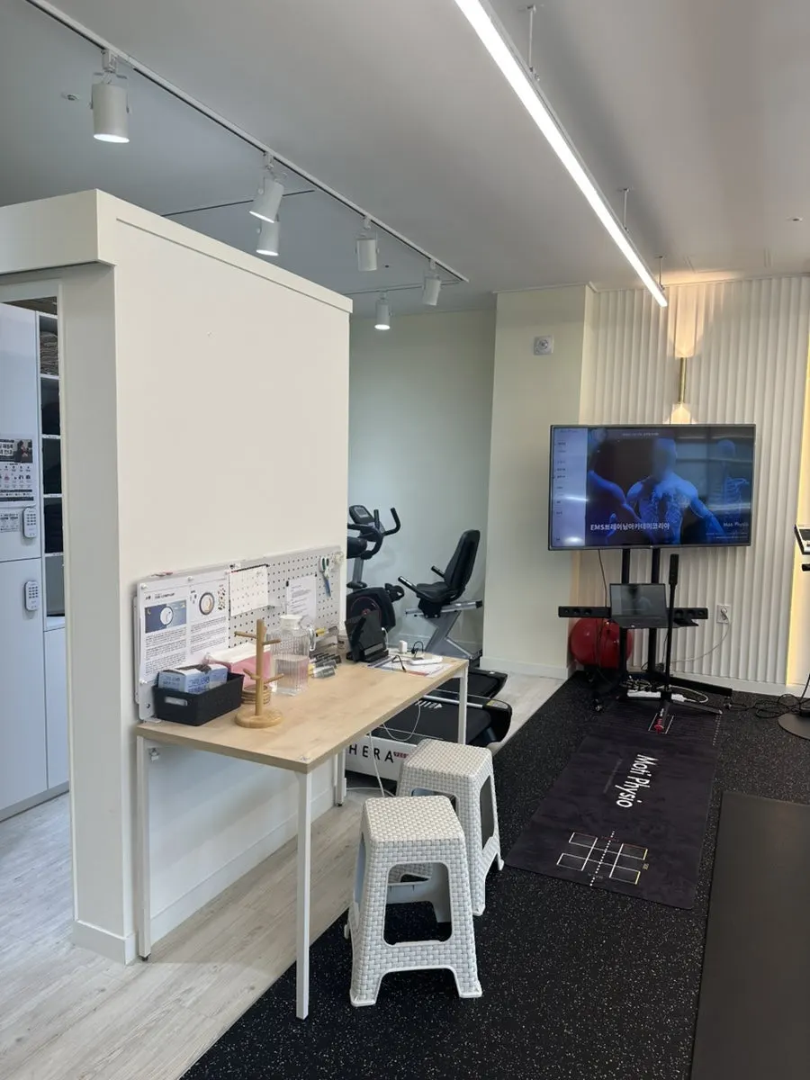 Workout area with gym balls and machines