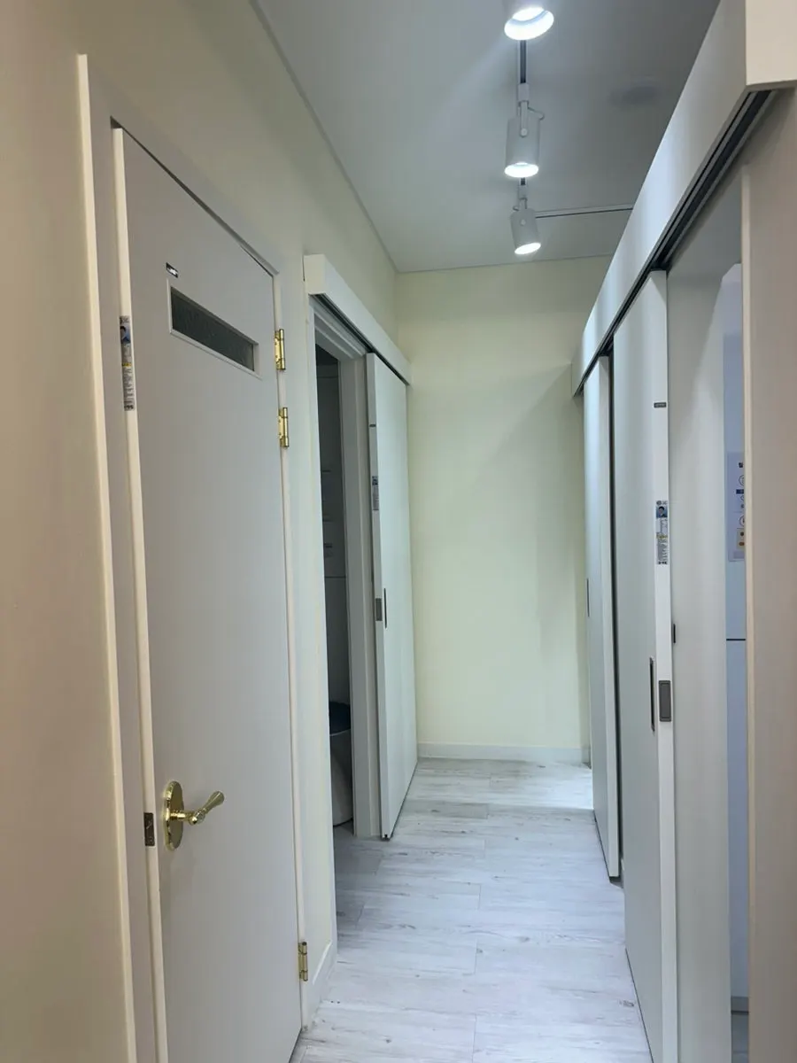 Neat changing area with EMS clothing hanging up