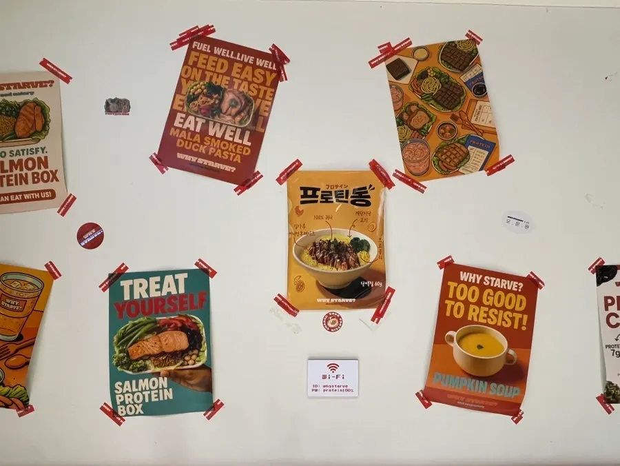 Poster-style menu photos on the wall