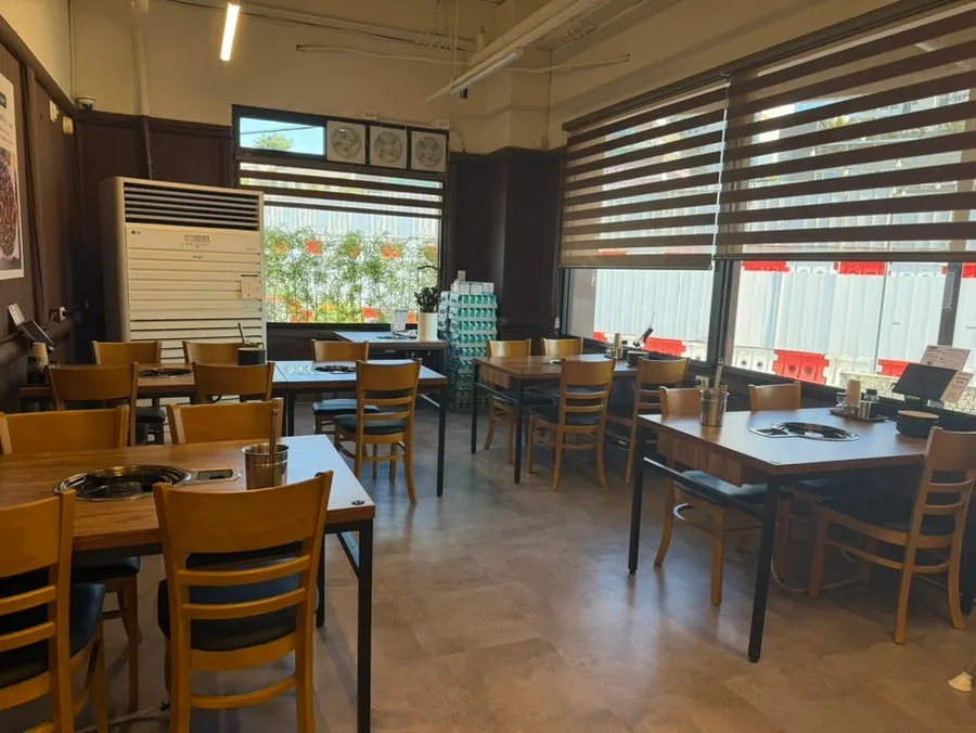 Wood-tone interior of the Yubok Kalguksu dining hall