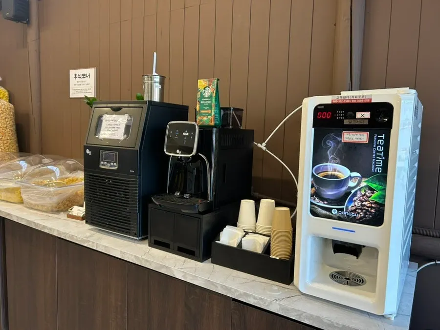 Dessert corner with snacks and a coffee machine