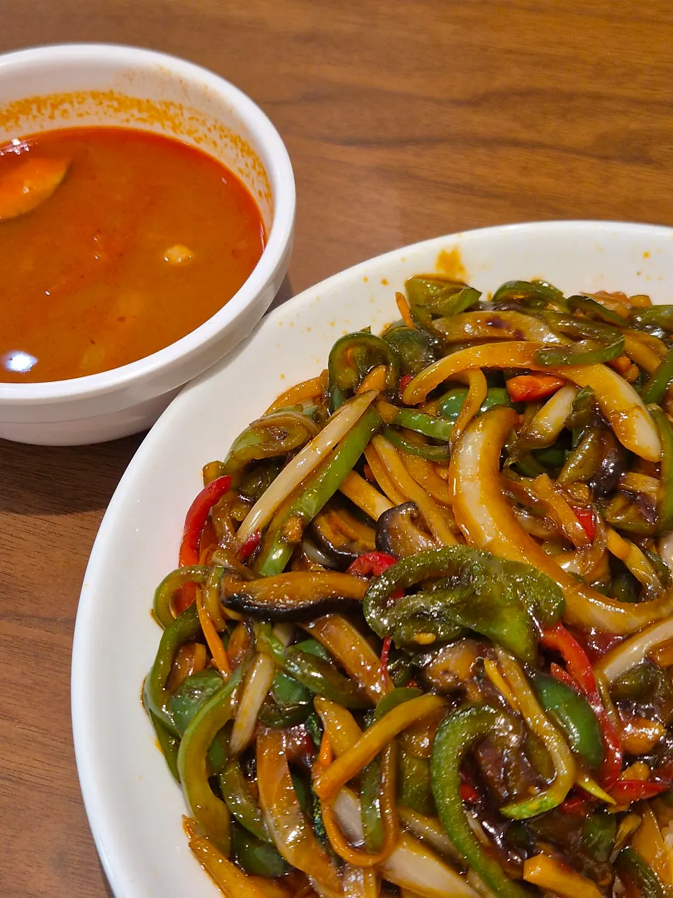 Close-up of a spoonful of gochu japchae bap