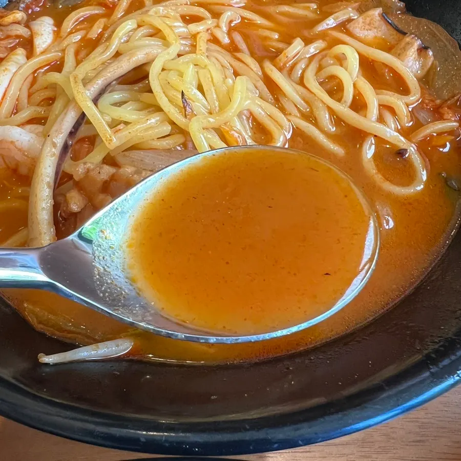 Seafood pieces inside the seafood jjampong