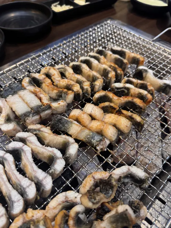 Eel grilling over charcoal