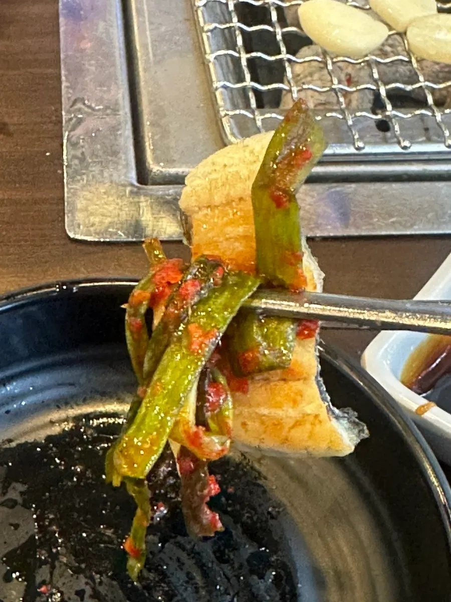 Spicy sauce served alongside the eel
