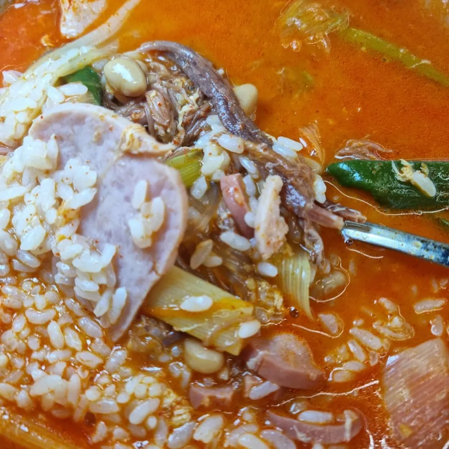 Mixing rice into the yukgaejang broth