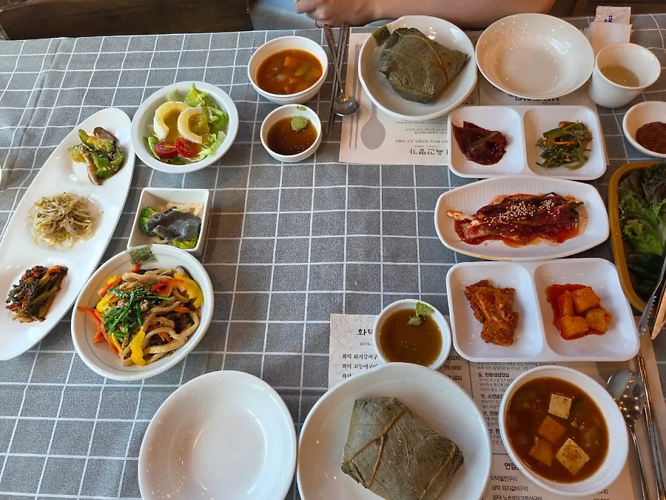 Full spread of the clay-oven lotus leaf rice pork galbi set