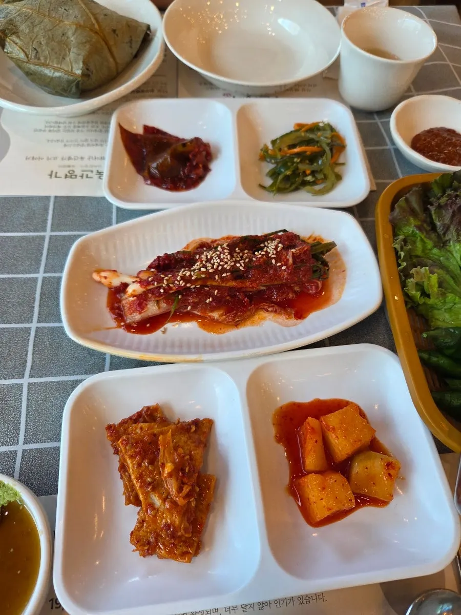 Kimchi, japchae, and seasoned vegetables among the 10-dish banchan