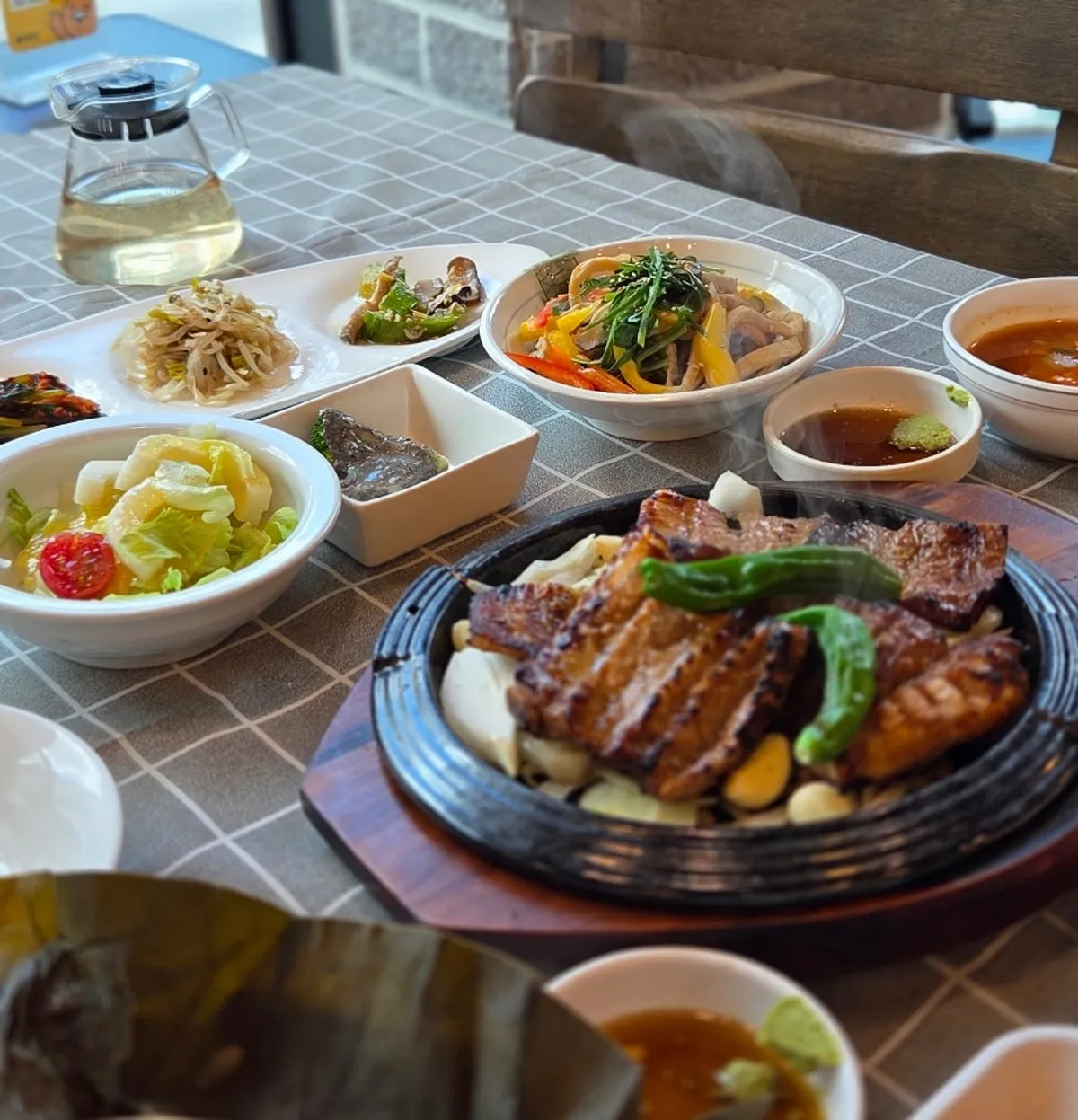 Full table spread of the lotus rice galbi set at Yukganmyeongga