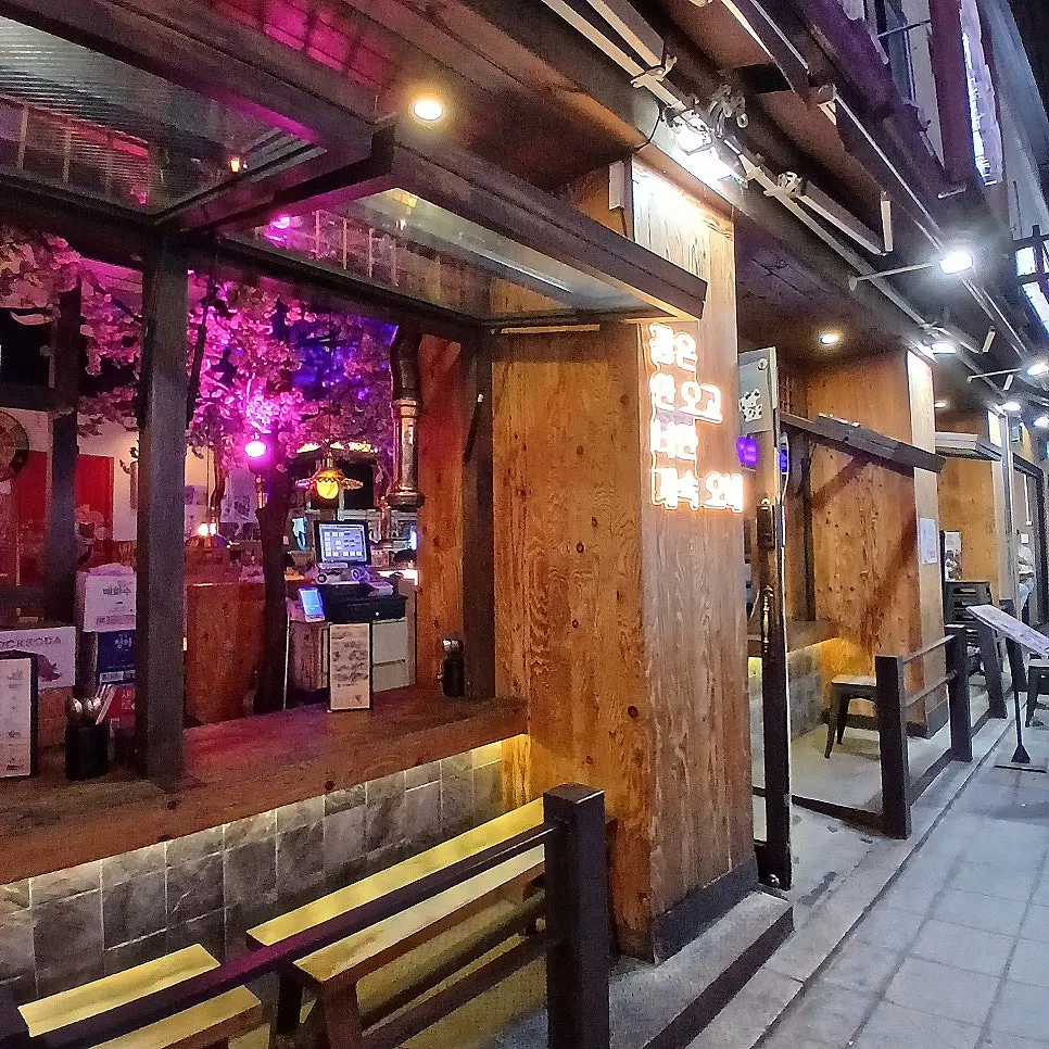 Entrance of Yukhoe Gongjakso lit with cherry blossom lights