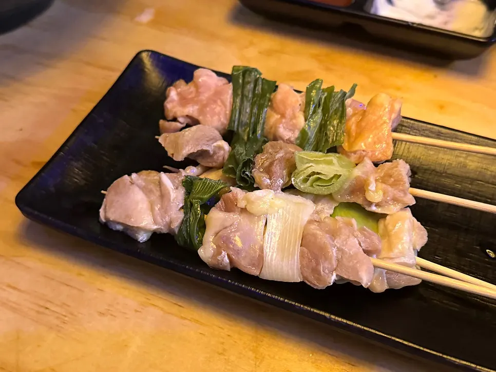 Yakiniku and raw beef arranged together on the table