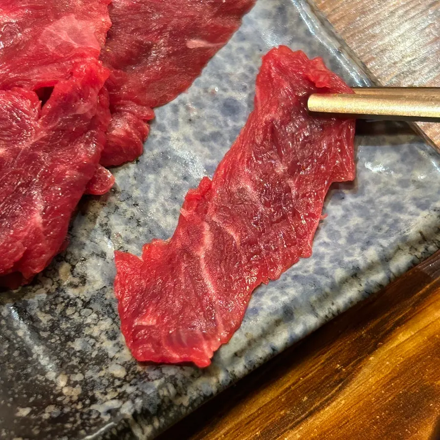 Plate of thickly sliced beef sashimi