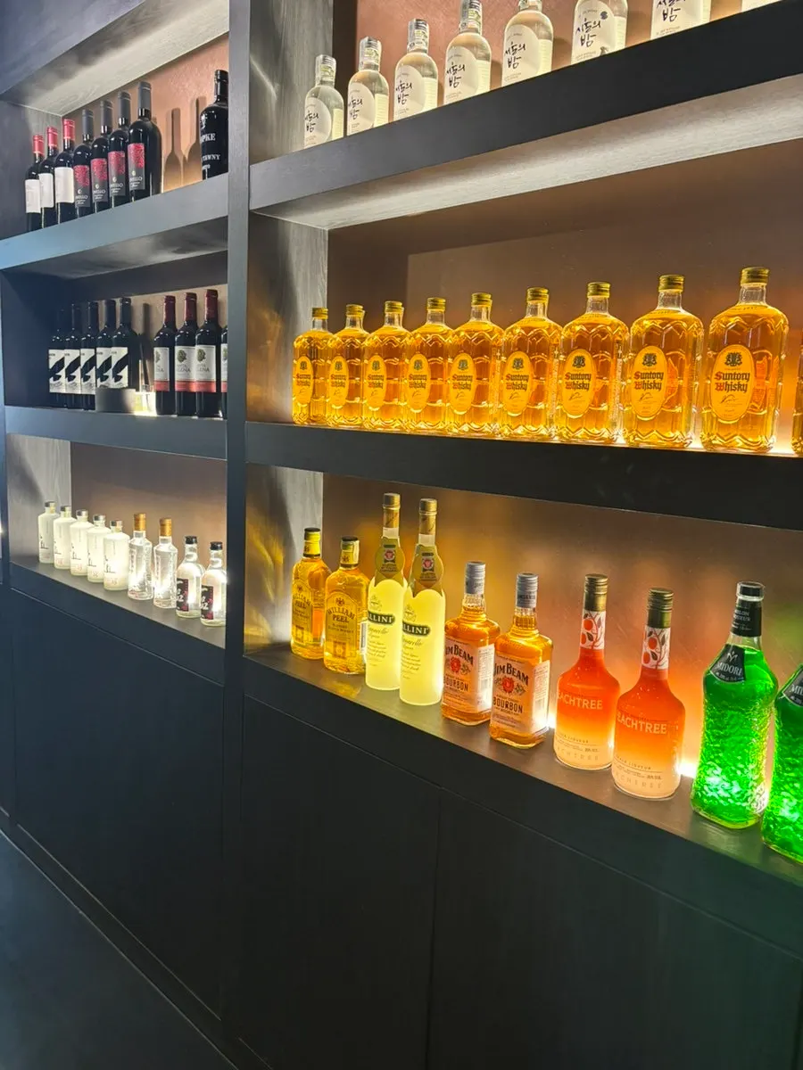 Yukrab Jongno entrance with liquor bottle decor