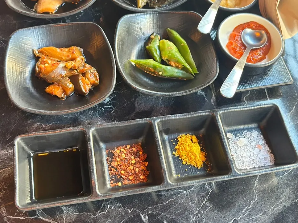 Yukrab's sauce lineup including tzuran and curry powder