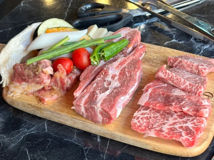 Galbi set served with grillable vegetables and cheese