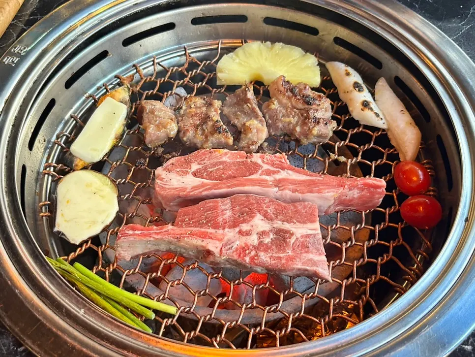 Lamb ribs cooking on the grill