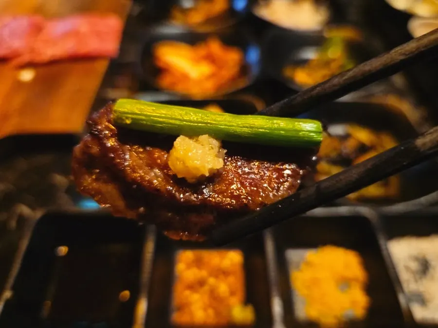 Thick beef cut grilling over charcoal
