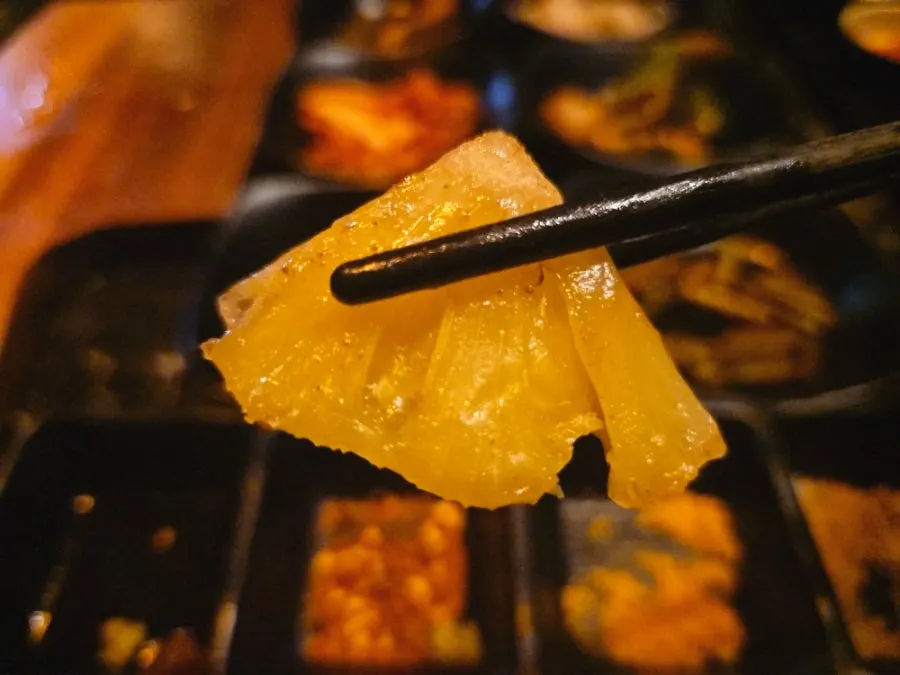 A piece of grilled pineapple
