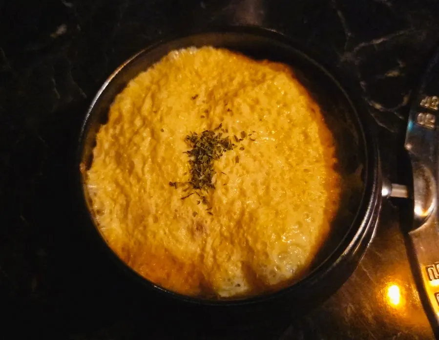 Steamed egg served in an earthenware bowl