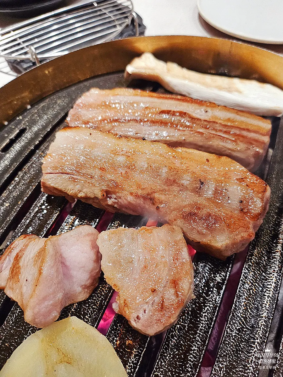 A crispy-outside, juicy-inside piece of grilled pork belly