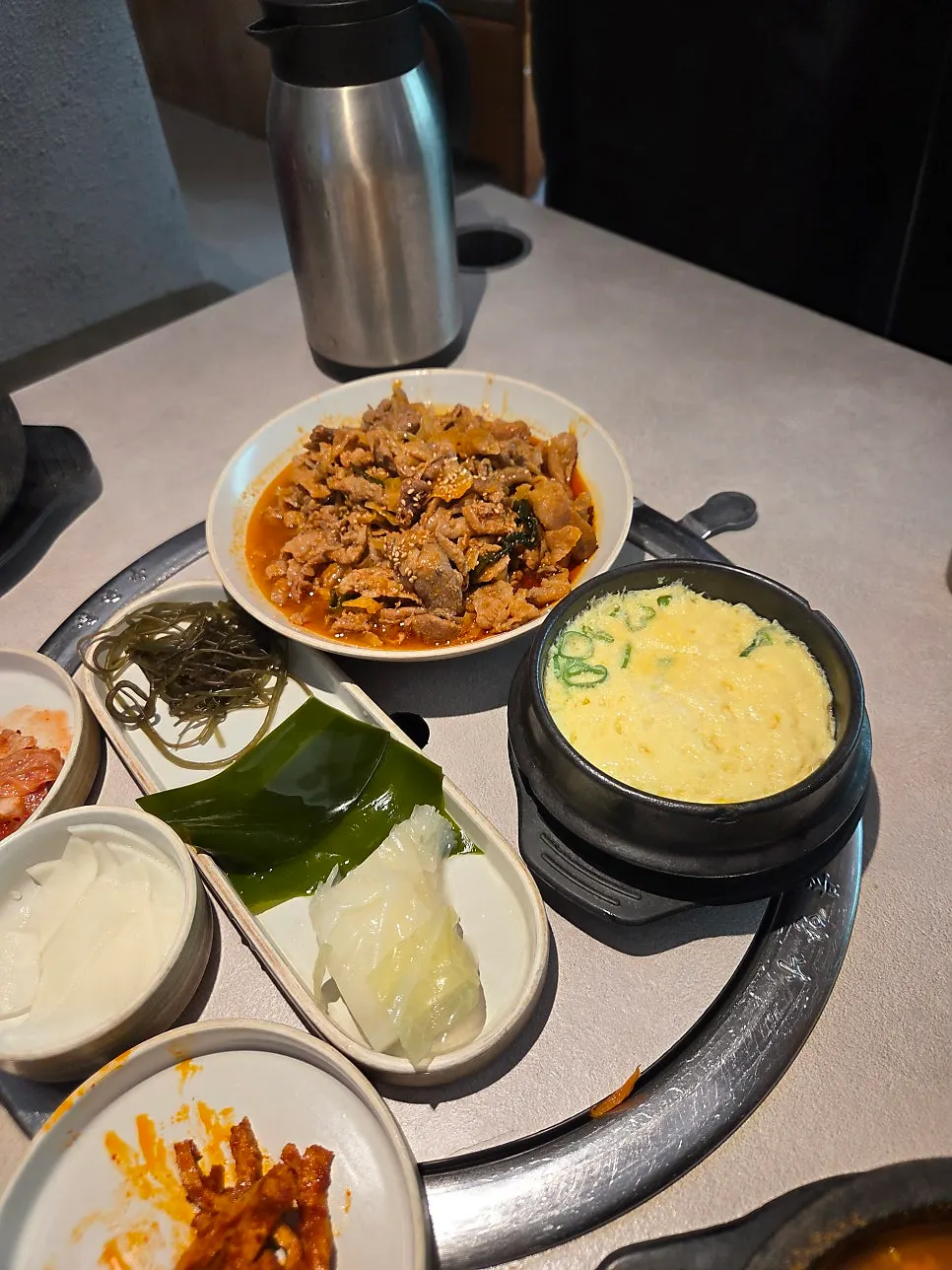 Steamed egg served alongside the stir-fried pork