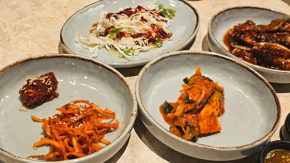 About 9 banchan side dishes served at Yukmong Bangi Direct Branch