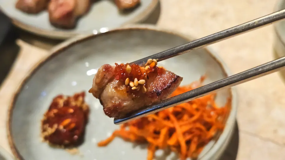 Meat cut into bite-sized pieces after grilling