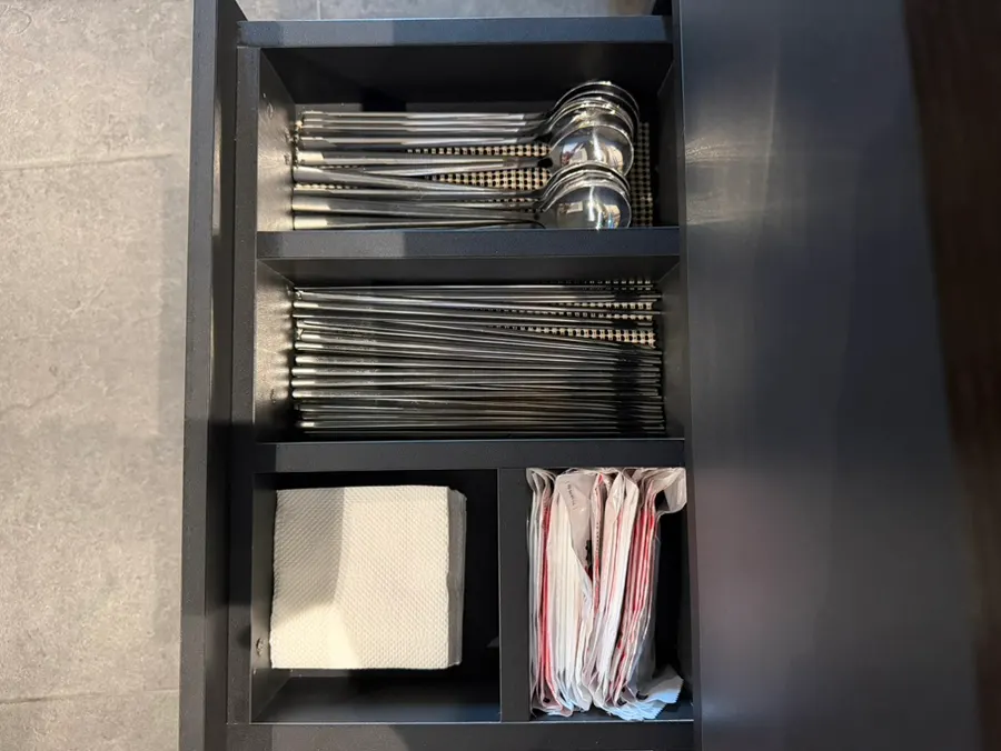 Table setting with cutlery and tissues