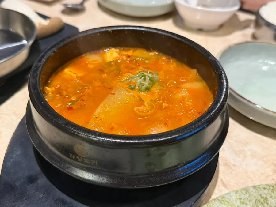 Doenjang jjigae served alongside the meat