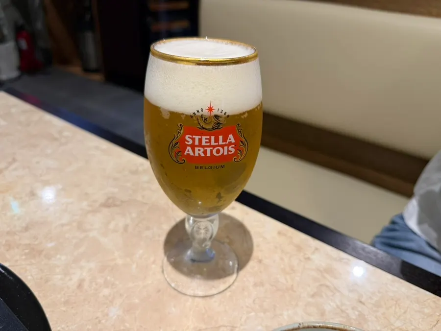 Stella draft beer enjoyed with the meat