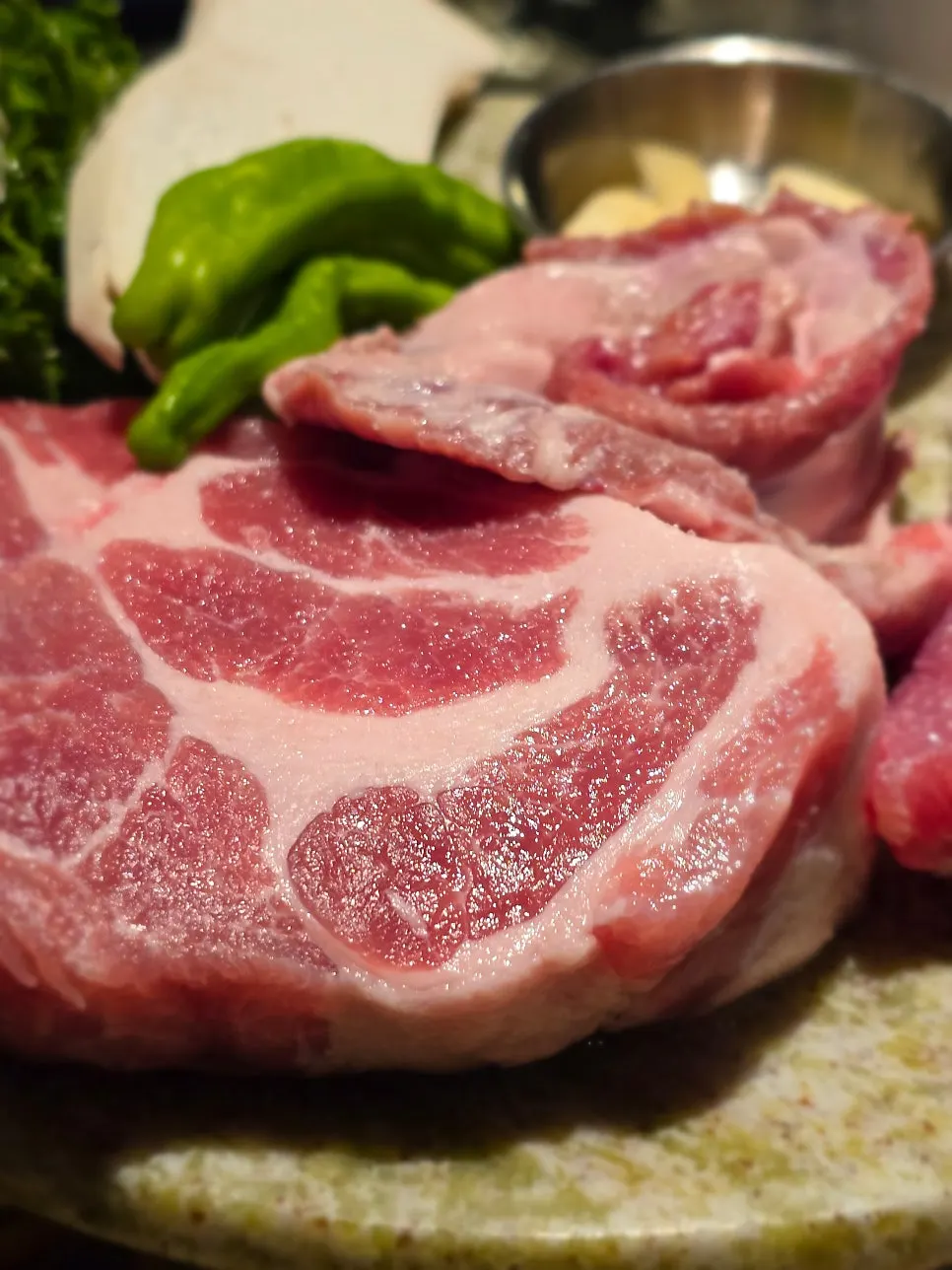 Plate of thick raw cuts from the pork sampler set