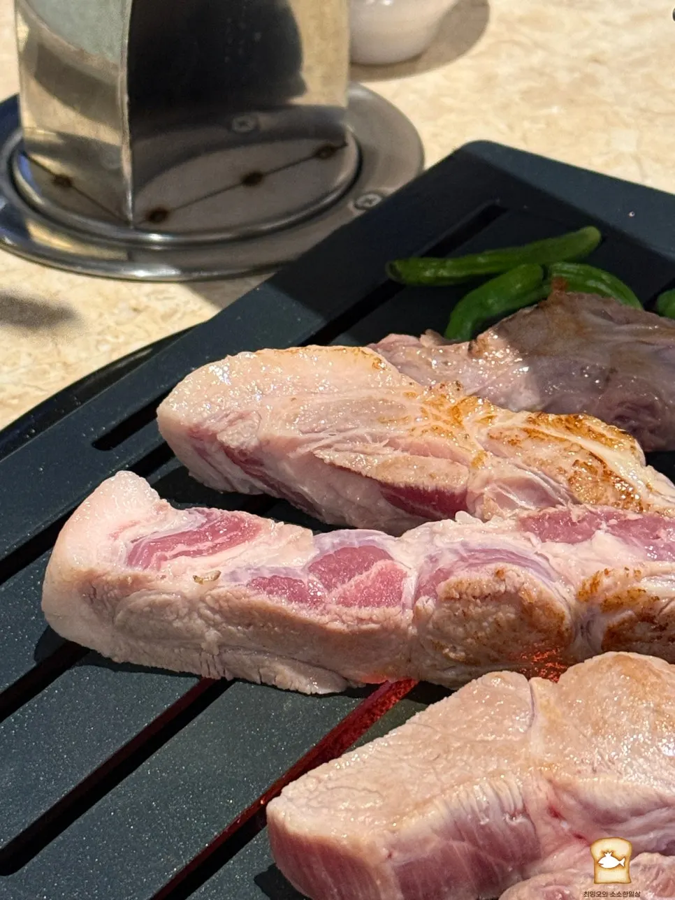 Meat being grilled on the special grill plate