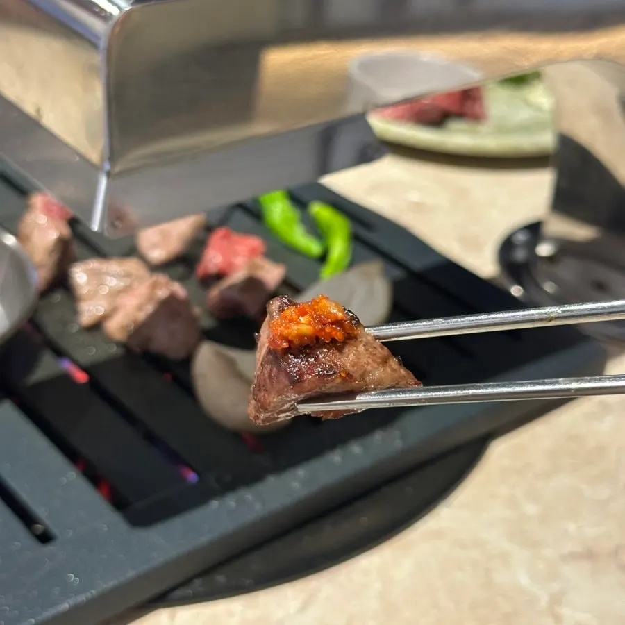 A piece of ribeye served with wasabi