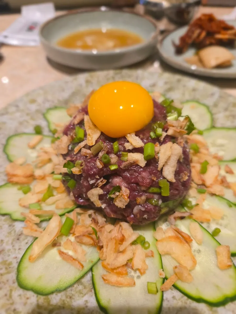 A plate of beef tartare with vivid color