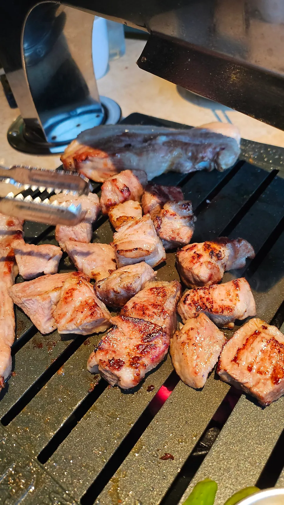 Thick-cut rib pork belly grilling on the table